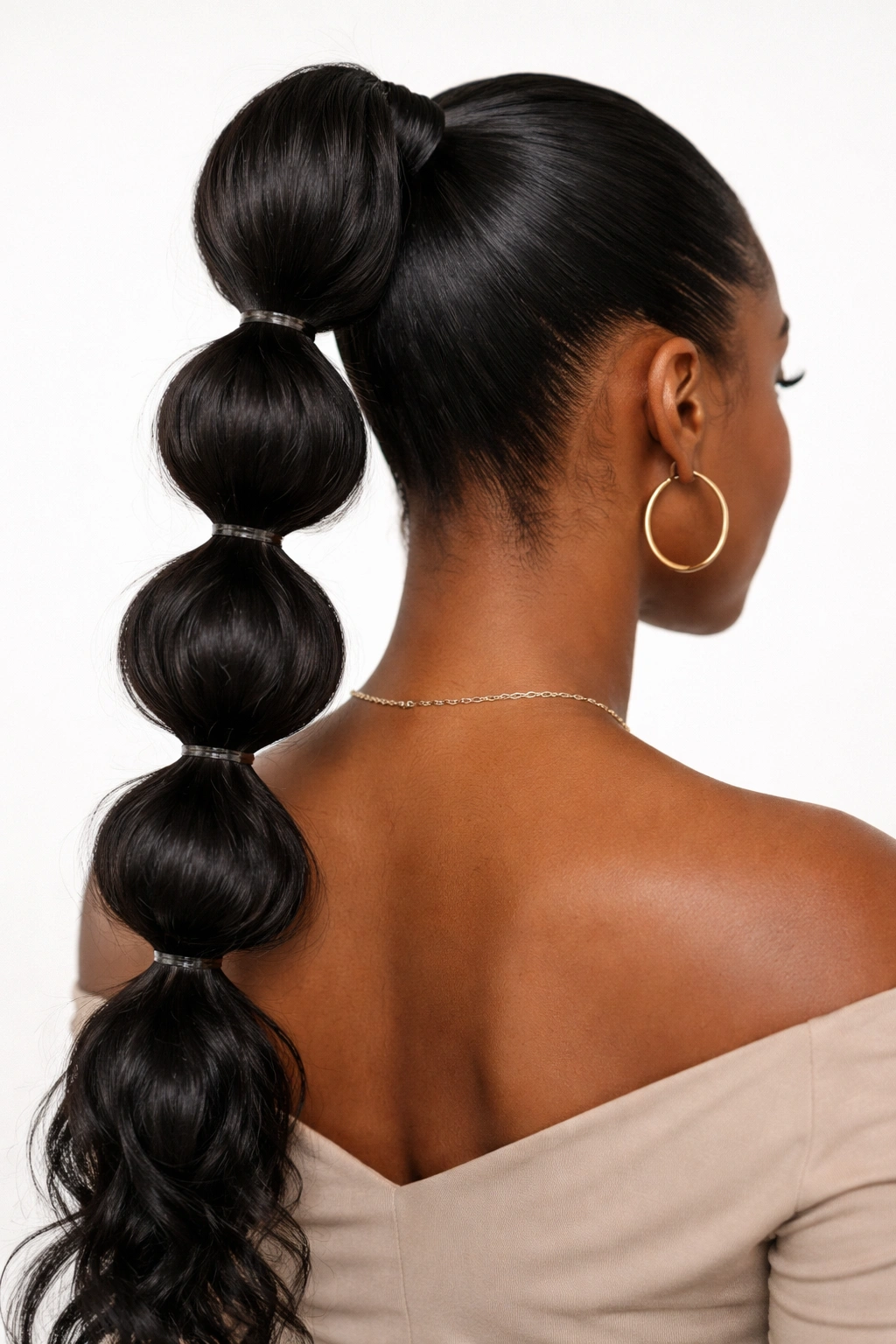 Back view of a bubble ponytail with elastic bubbles along the length