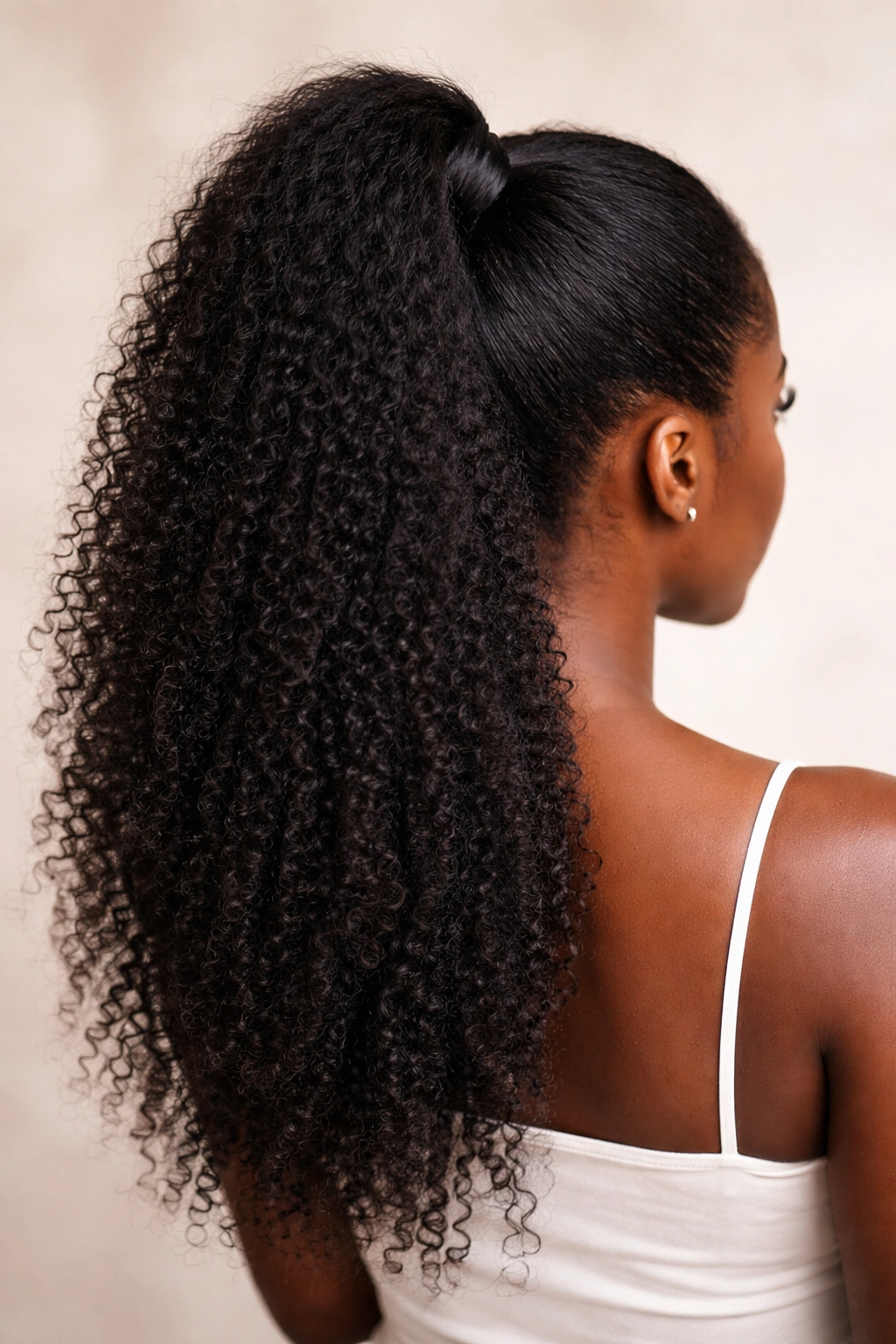 Half-up ponytail showing top gathered and bottom loose hair