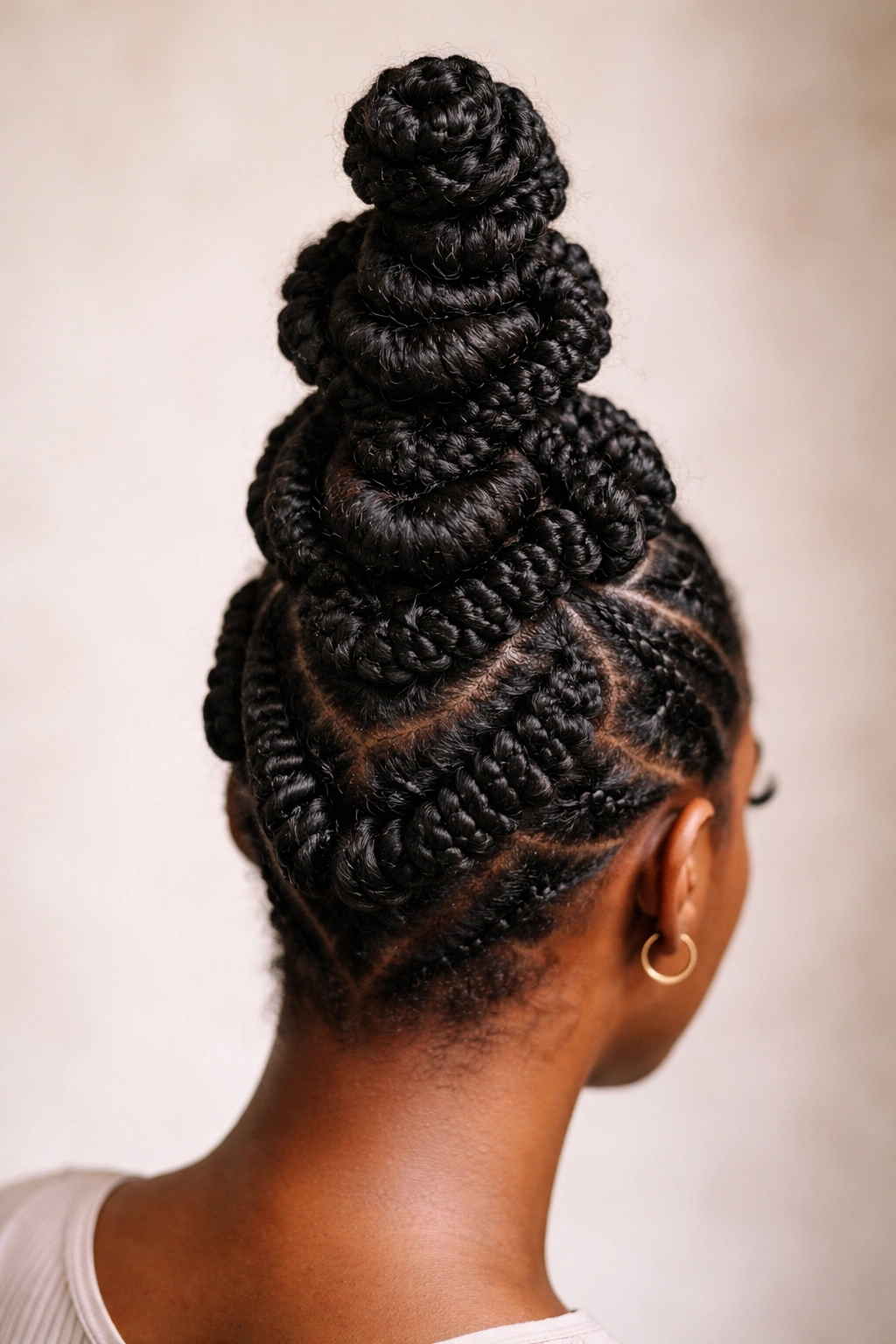 Stacked bantu knots creating height and texture on scalp