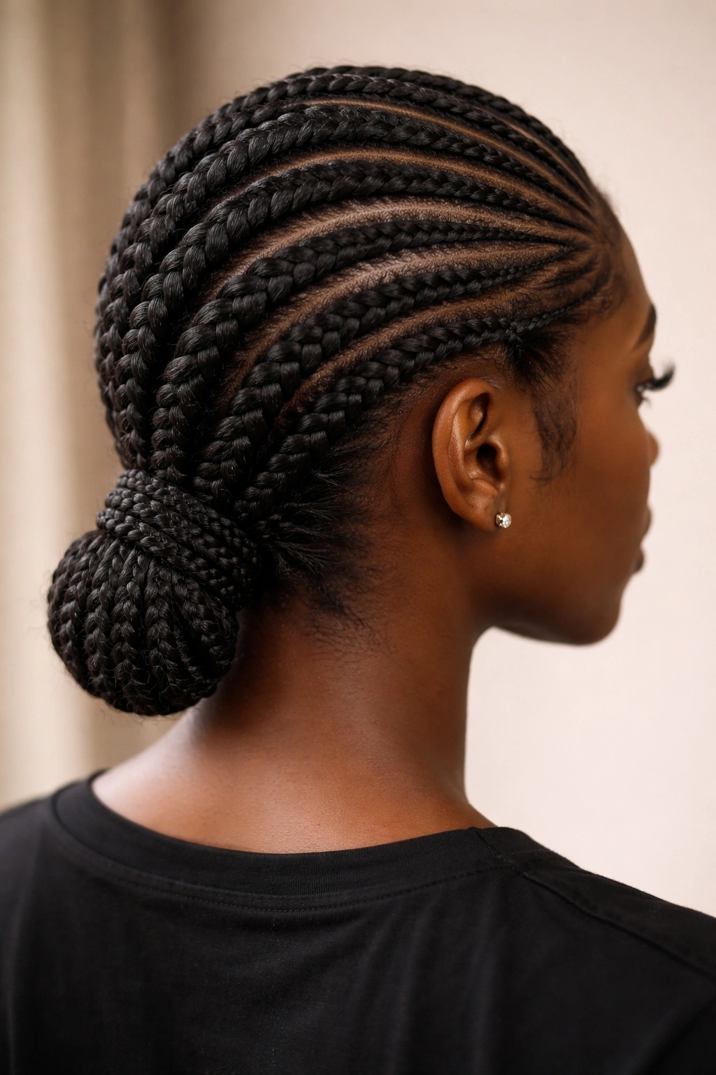 Stacked cornrows with varied sizes on thick 4C hair
