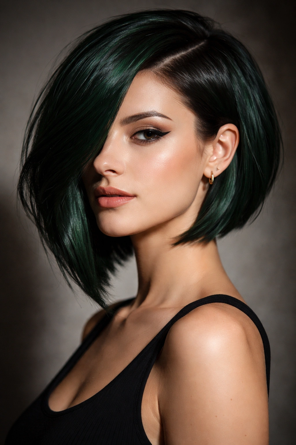 Deep forest green asymmetrical bob with one shorter side and longer opposite side