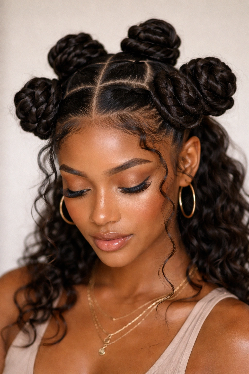 Jumbo crown knots forming a rounded silhouette around the crown