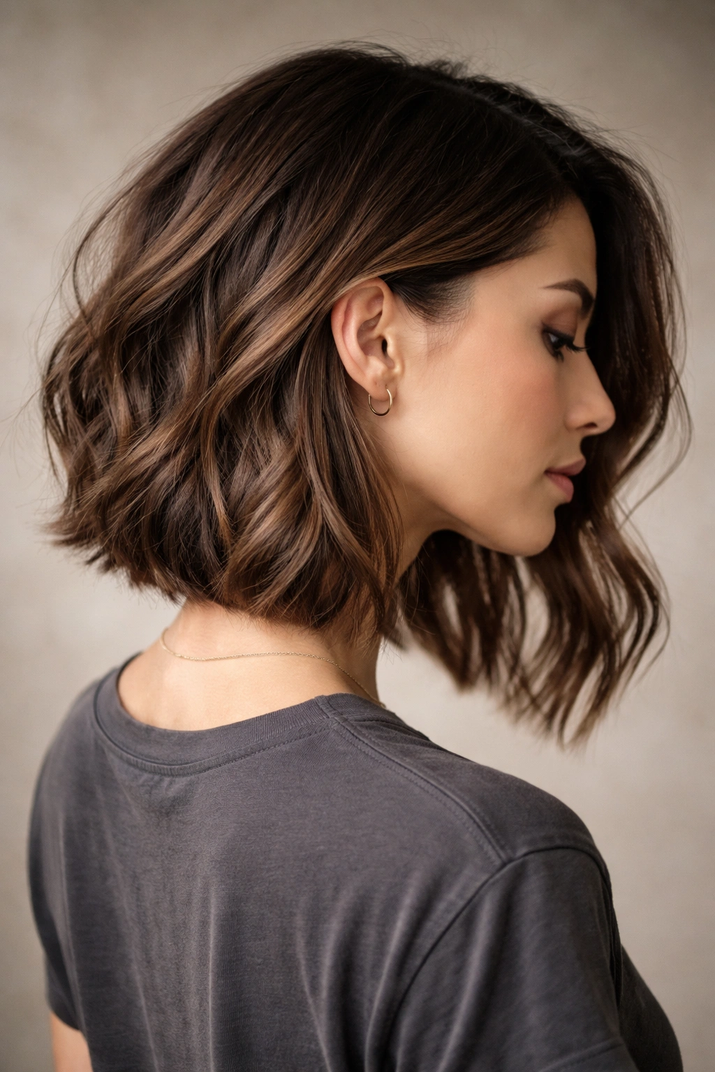 Long undercut bob showing collarbone length and lighter back due to undercut