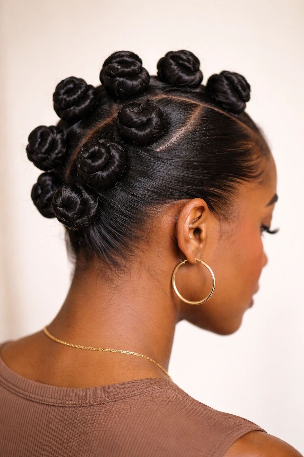 Close-up of a pinned-under Bantu knot updo with ends tucked under