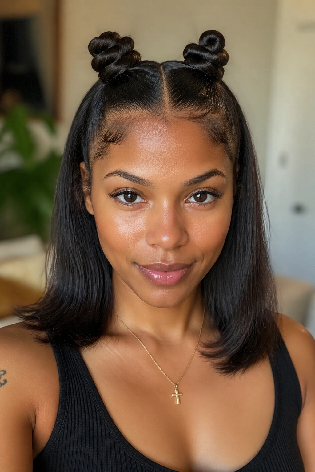 Real person with twin center-part knots and a sharp middle part