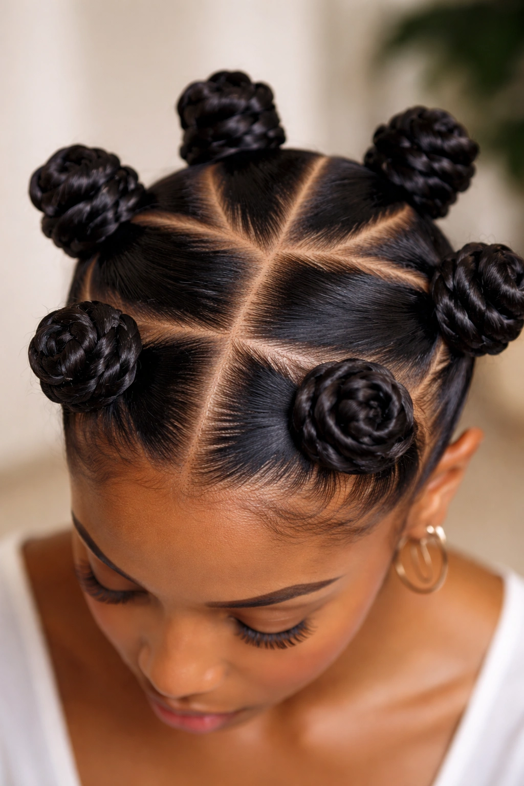 Top-down view of wide-spacing knots with visible scalp between sections