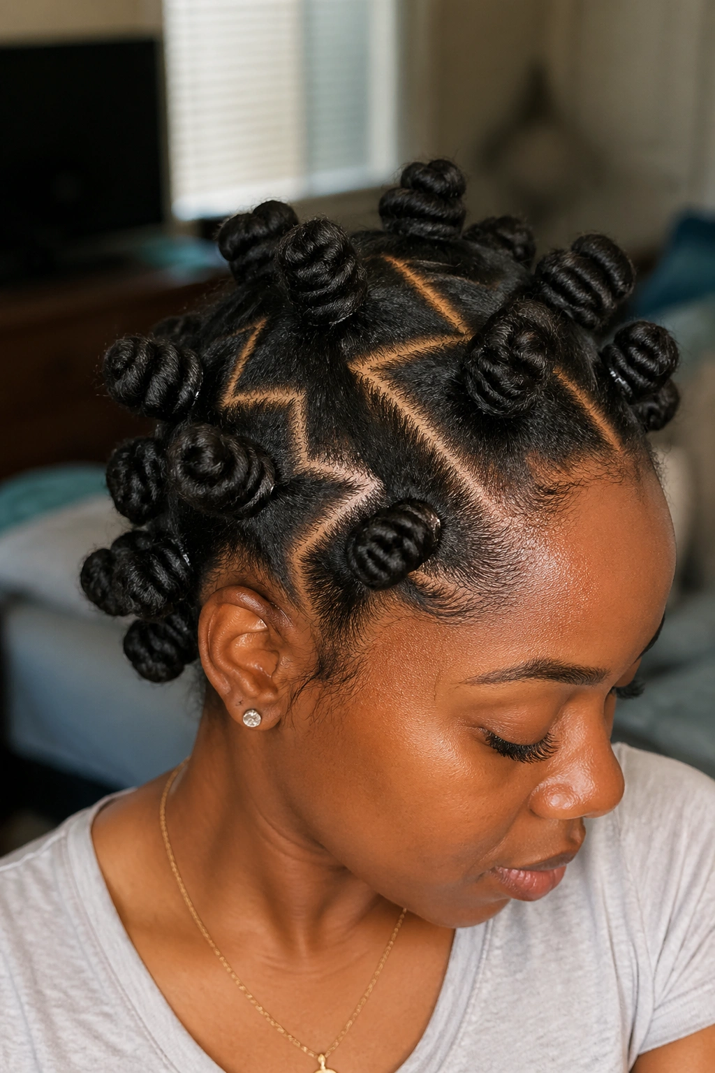 Close-up of a real woman with a zigzag part and Bantu knots on locs