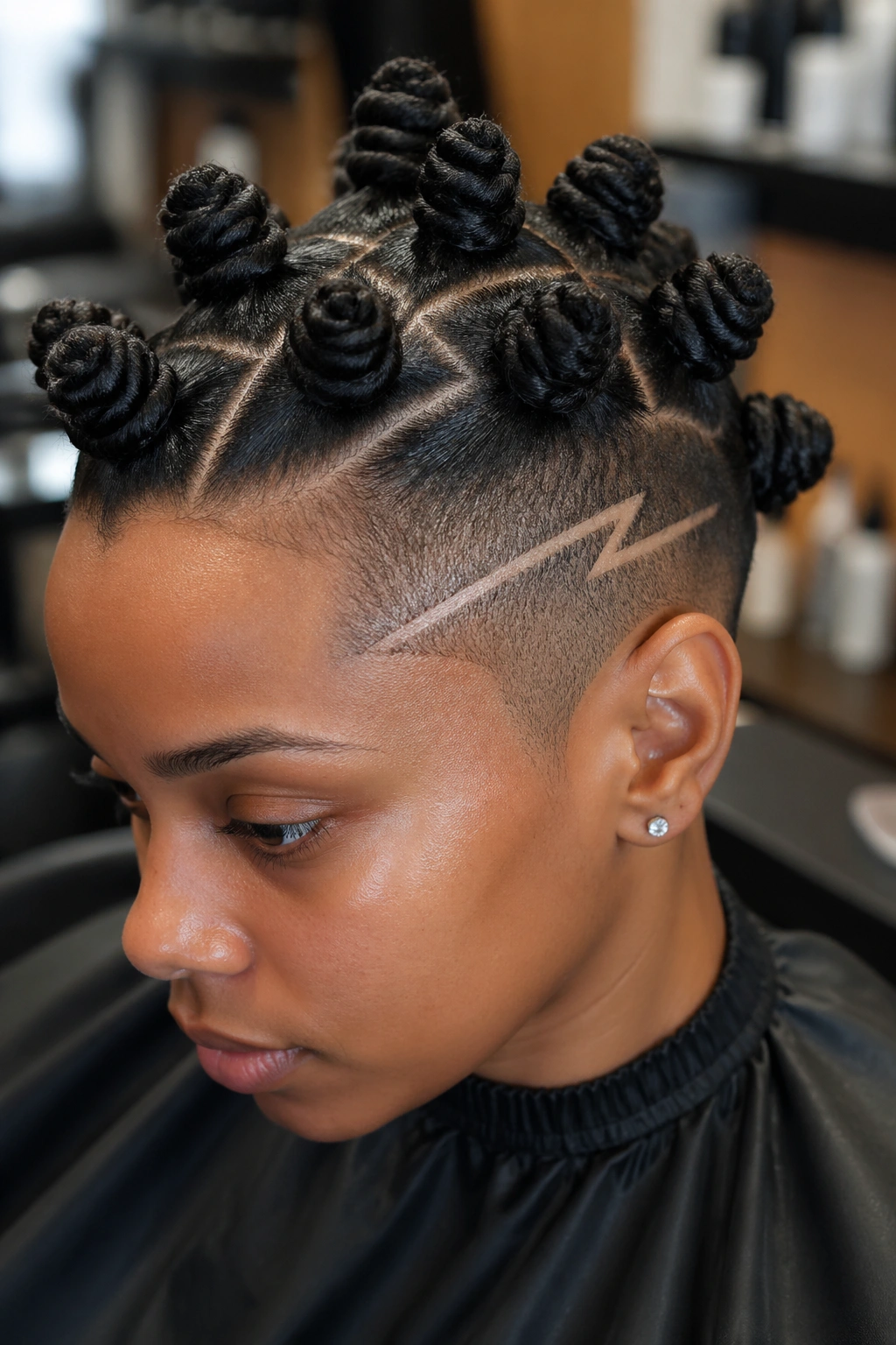 Close-up of a real person with zigzag-parted knots and shaved line on the temple.