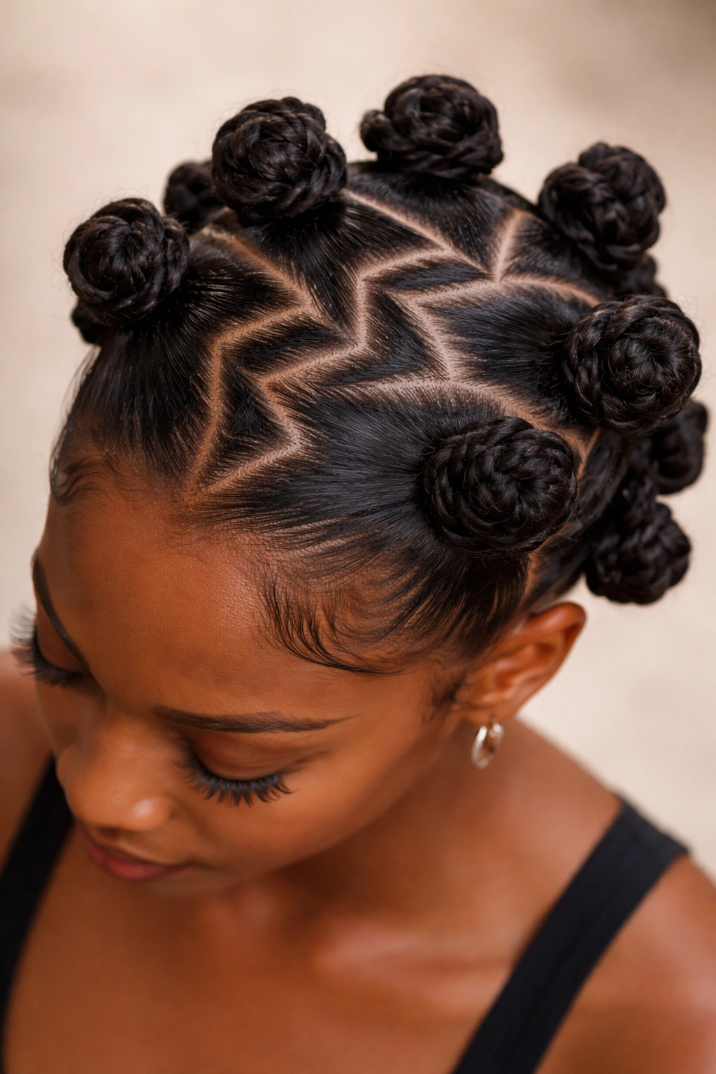 Close-up of zigzag-part knots with playful zigzag scalp lines