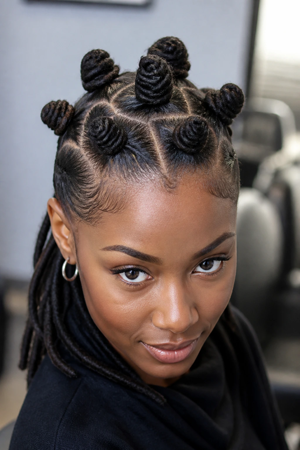Close-up portrait showing a high crown cluster of knots on the top head of a real person